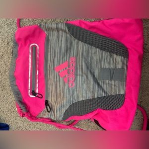 Adidas hot pink jaw string bag, with lots of pockets!